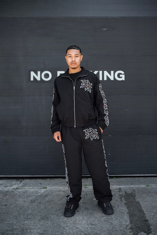 Mixed Emotions 'ME' Rhinestone Nylon Pants