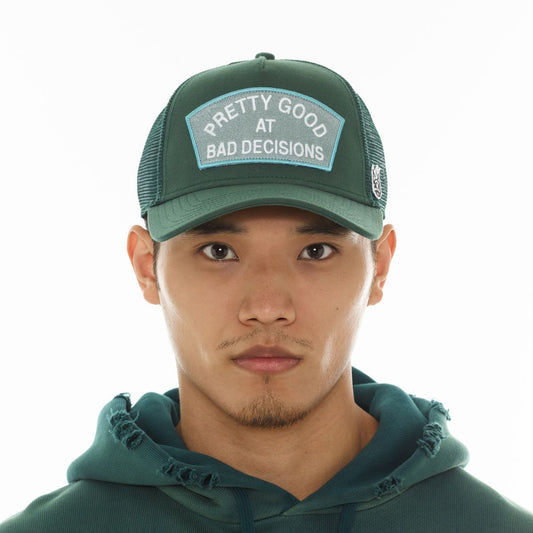 CULT MESH TRUCKER HAT "GOOD AT BAD DECISIONS" (626AC-CH75A)
