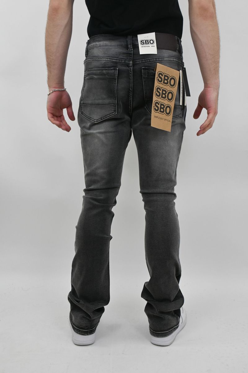 JET BLACK  Ripped Stacked Jeans