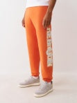 TRUE RELIGION TERRY APPLIQUE JOGGERS KOI ORANGE